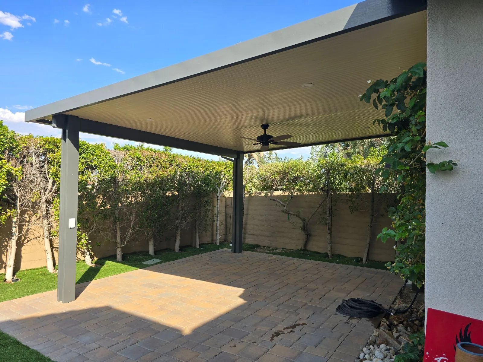 Weatherwood attached flat pan patio cover in Sandalwood and Slate on a DFW home