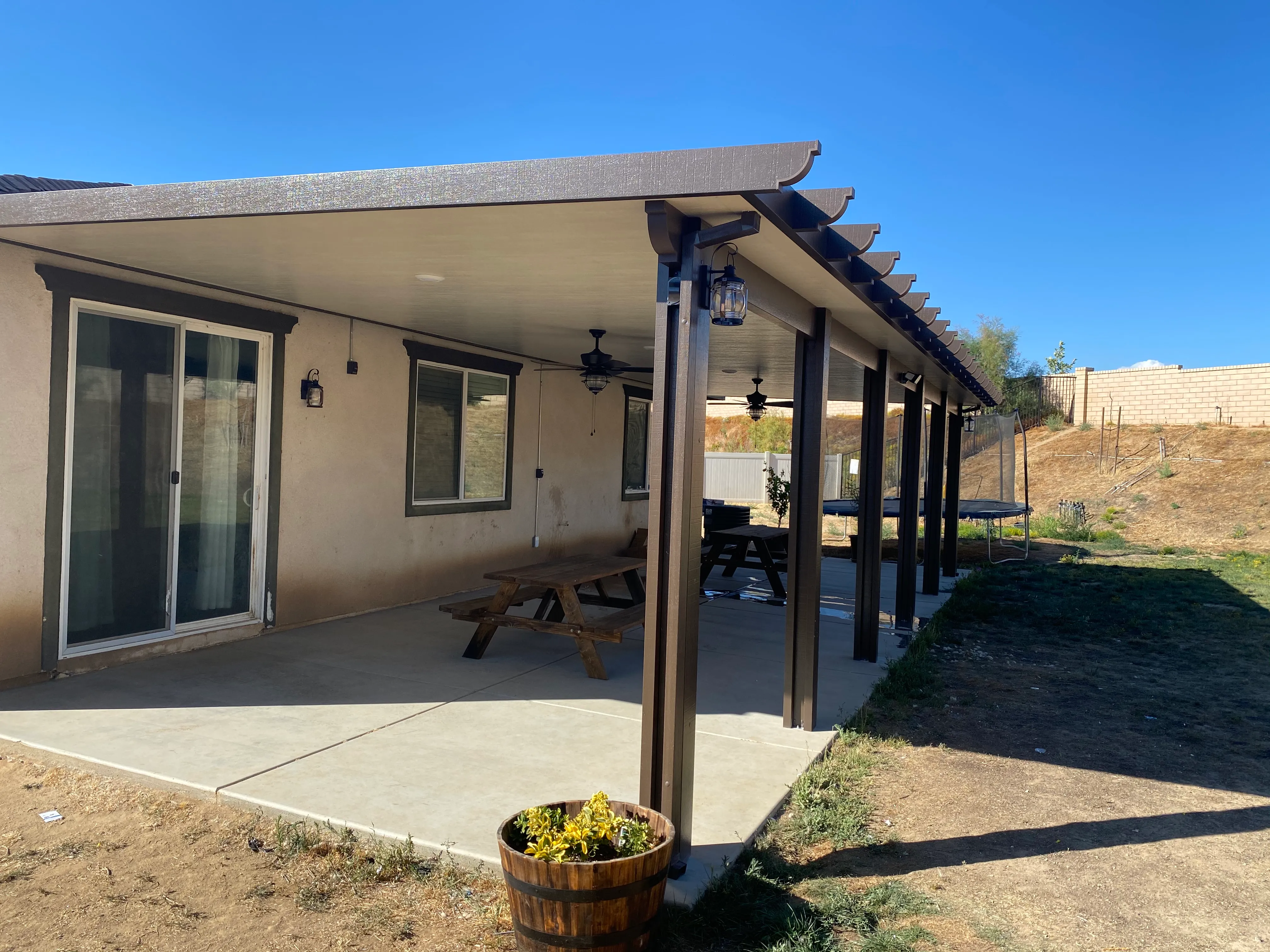 Duralum attached insulated aluminum patio cover with fan