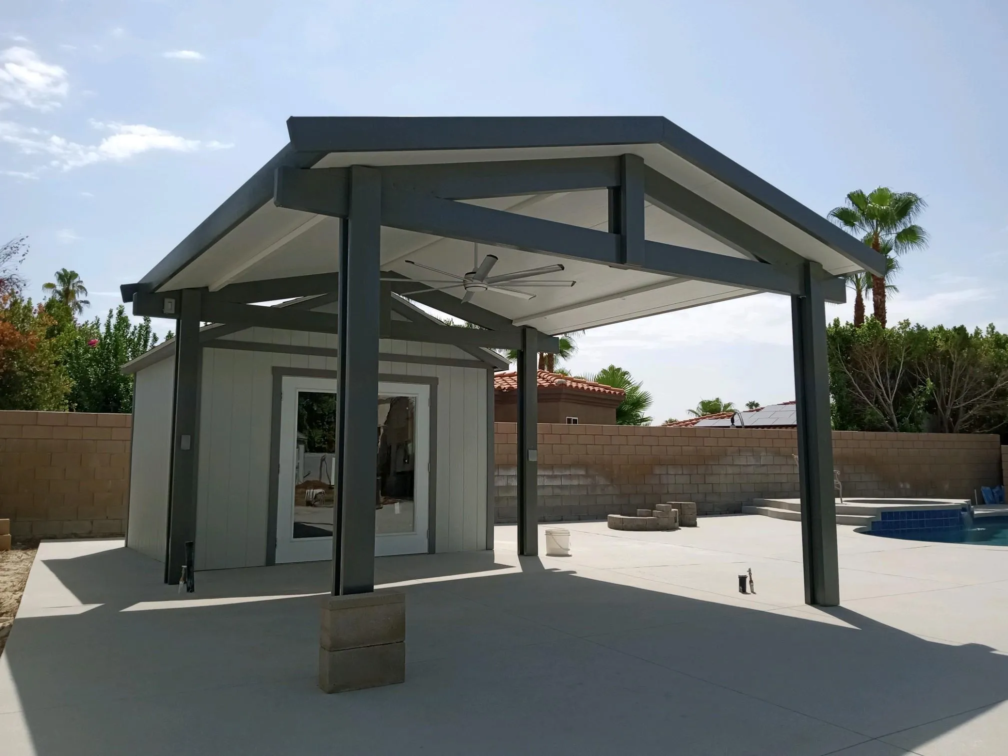 Weatherwood insulated gable roof with ceiling fan for a patio